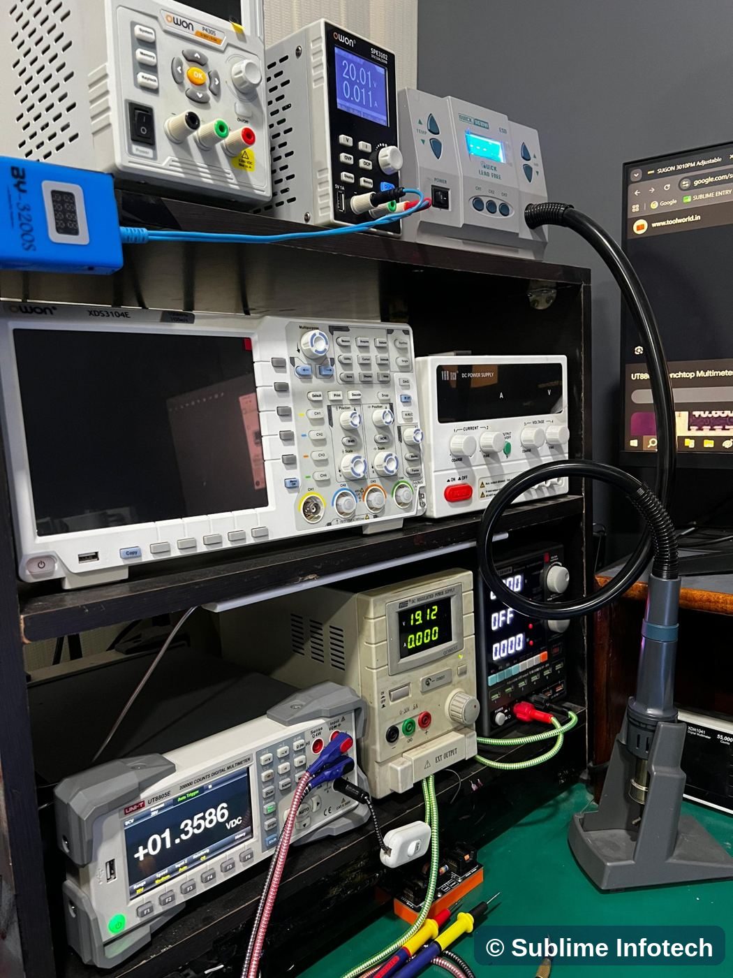 Oscilloscope and power supplies on rack