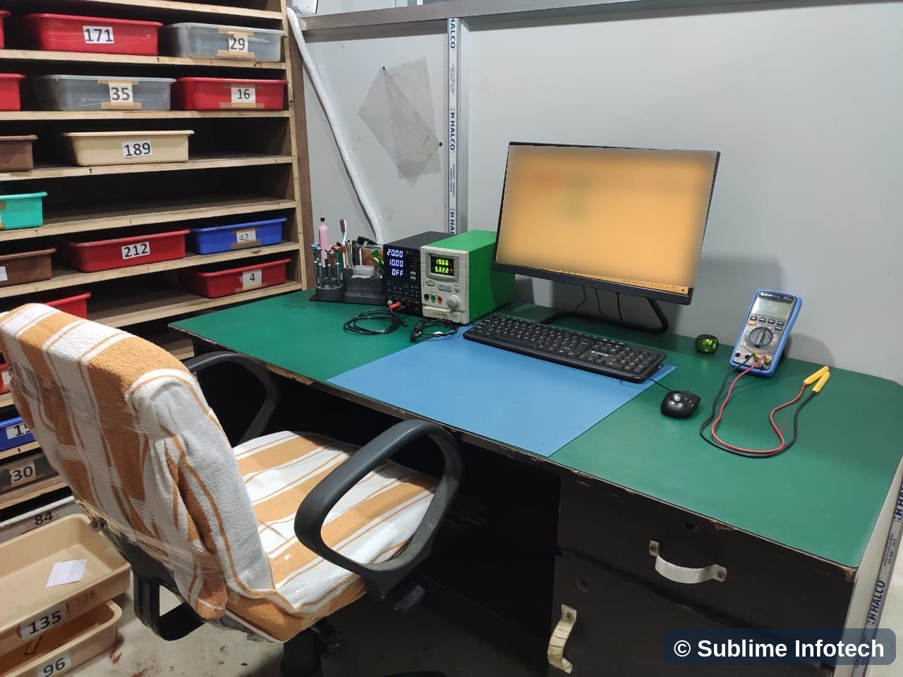 Entry desk with anti-static mat, power supply and meter